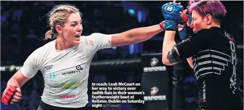  ?? GETTY IMAGES ?? In reach: Leah McCourt on her way to victory over Judith Ruis in their women’s featherwei­ght bout at Bellator, Dublin on Saturday night