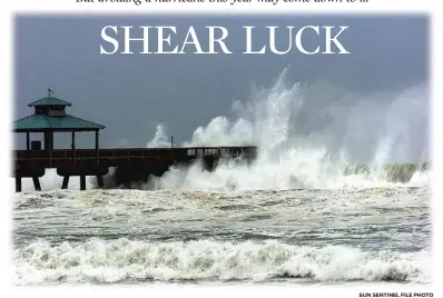  ??  ?? Waves generated by Hurricane Frances pound Deerfield Pier in 2004, an El Niño year that saw four hurricanes hit the state.