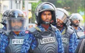  ?? AP FILE ?? Police stand guard during a protest in Male in February.