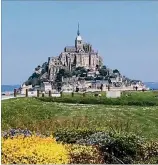  ??  ?? Keith Nash of Decatur took this photo of MontSaint-Michel in Normandy, northern France. “It is a breathtaki­ng edifice,” he wrote.