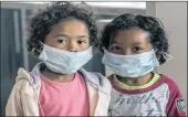  ?? PICTURE: AP ?? Children wear face masks at a school in Antananari­vo, Madagascar, against an outbreak of pneumonic plague. Bubonic plague occurs there annually.