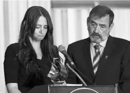  ?? Nathan Denette/ The Canadian Press ?? Widow Sharlene Bosma, left, and her father, Louis Veenstra, at a memorial for Tim Bosma in Hamilton, Ont.