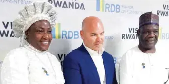  ??  ?? Rwanda Chief Investment Officer, Guy Baron (centre), flanked by Reverend Mother Esther Abimbola Ajayi and “husband, Reverend Dr Ademuyiwa Ajayi in Kigali, Rwanda