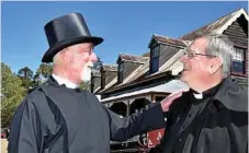  ??  ?? Reverend Bill Watson, locum tenes in the Drayton Parish (left) and Mark Carlyon Archdeacon of the Downs, in costume as Benjamin Glennie.