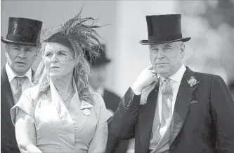  ?? ADAM DAVY/PA WIRE TRIBUNE NEWS SERVICE FILE PHOTO ?? Prince Andrew, right, in June with ex-wife Sarah Ferguson, faces new scrutiny over his ties to Jeffrey Epstein.