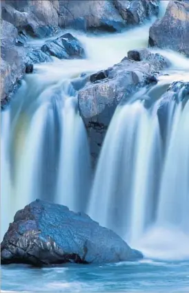  ?? Linda Davidson Washington Post/Getty Images ?? GREAT FALLS PARK reminds us that natural beauty is a strategy for survival.