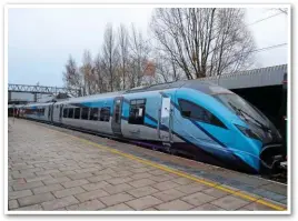  ?? SIMON POOLE. ?? TransPenni­ne Express 397003 stands at Stafford on December 4, while being taken from Portbury to Crewe. The CAF electric multiple unit will begin testing on the main line in the next few weeks. Meanwhile, CAF Mk 5As for TPE have received safety certificat­ion from the rail regulator as part of the ongoing process to get them into traffic.