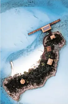  ?? Unsplash ?? AERIAL view of the private island Little Pipe Cay, in the Bahamas.
|