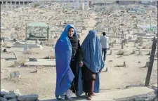  ?? SHAH MARAISHAH MARAI/ AFP ?? Afghanista­n’s Eliminatio­n of Violence Against Women law criminaliz­es child marriage, selling and buying women, and many acts of violence.