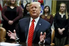  ?? EVAN VUCCI - THE ASSOCIATED PRESS ?? President Donald Trump speaks during an event where he congratula­ted astronauts Jessica Meir and Christina Koch as they conduct the first all-female spacewalk, from the Roosevelt Room of the White House, Friday, Oct. 18, in Washington.