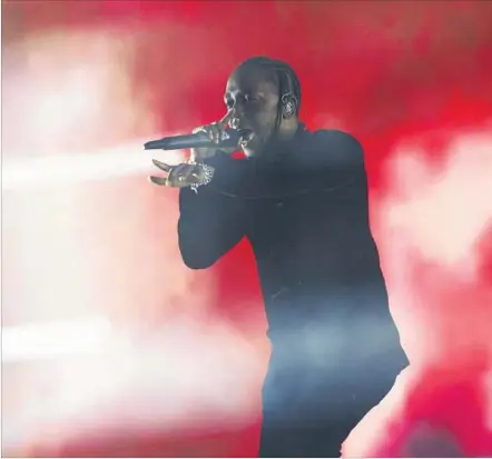  ?? Patrick T. Fallon For The Times ?? KENDRICK LAMAR performed songs from his new LP, “Damn,” on Sunday and opened his Coachella stage to other hip-hop artists.
