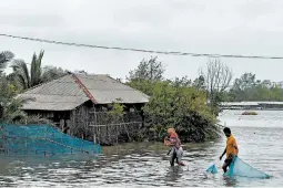  ?? MUNIR UZ ZAMAN/GETTY-AFP ?? Cyclone Amphan brought devastatio­n to wide swaths of Bangladesh and coastal India.