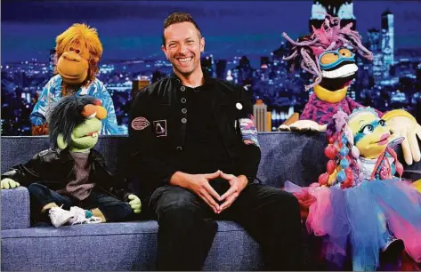  ?? NBC/NBCU Photo Bank via Getty Images ?? Below, puppeteer Tyler Bunch attends Brian Henson presents “Puppet Up! - Uncensored” at The Venetian Las Vegas on July 29, 2016 in Las Vegas, Nevada. Above, The Weirdos featuring Chris Martin of Coldplay during an interview on Friday, June 10.