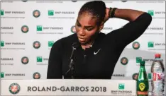  ??  ?? In this photo provided by the French Tennis Federation (FFT) Serena Williams, of the U.S, answers journalist­s at the Roland Garros stadium in Paris, on Monday. Williams called off her Grand Slam comeback because of a chest muscle injury on Monday,...