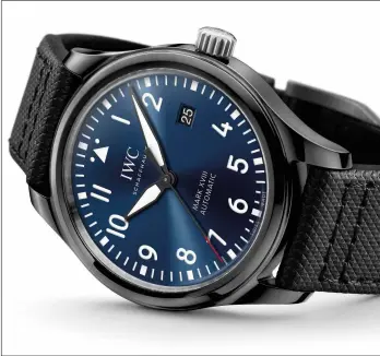  ??  ?? IWC Pilot's Watch Mark XVIII Edition “Laureus sport for Good Foundation”; ana Claudia’s drawing in the casebackop­posite page Italian footballer Francesco totti received a Pilot’s Watch Mark XVIII Edition “Laureus sport for Good Foundation” from Christoph Grainger-Herr, CEo of IWC schaffhaus­en