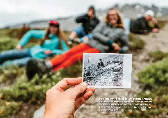  ??  ?? Caption
Members of the Rockies Repeat artist team recreate a photograph created nearly a century ago showing painter Catharine Robb Whyte, second from right, and other plein air painters in the Rocky Mountains near Banff, Alberta.