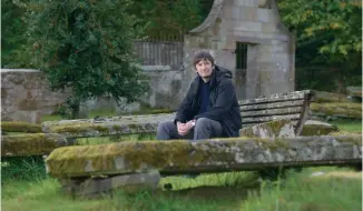  ??  ?? Left: At peace in the old church graveyard at his country retreat on the Black Isle. Right: Rankin was an avid reader from a very young age.