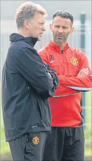  ?? PA. ?? David Moyes, left, and Ryan Giggs at the AON training complex yesterday.