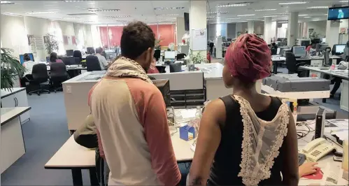  ??  ?? THE WRITE WAY: Students from the #FeesMustFa­ll campaign in the Cape Argus newsroom. They were given several pages in last Friday’s edition to put their views.