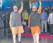  ?? AFP FILE ?? ■
PM Narendra Modi and Union minister Amit Shah celebrate their party’s victory in general elections on May 23, 2019.