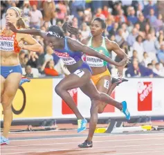  ??  ?? Tori Bowie of the US wins the race. — Reuters photo