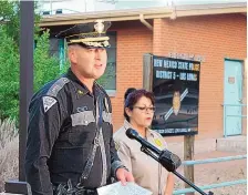  ?? JULIA M. DENDINGER/VALENCIA COUNTY NEWS-BULLETIN ?? New Mexico State Police Chief Tim Johnson and Valencia County Sheriff Denise Vigil brief reporters on a shooting incident that injured two Valencia County deputies and left one suspect dead.