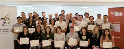  ?? ?? Italian Ambassador Marco Clemente (second row, center) with the participan­ts to the second level of the AIS sommelier course.