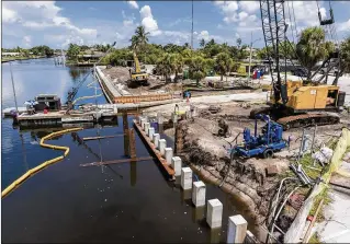  ?? RICHARD GRAULICH / THE PALM BEACH POST ?? After constructi­on on the new seawall at Anchorage Park Marina is complete, other amenities including 16 boat slips and a 250-foot floating dock will be added.