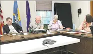  ?? File photo ?? The East Hampton Board of Finance is shown at a recent meeting in Town Hall.