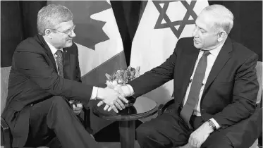  ?? Sean Kilpatrick/ The Canadian Press ?? Israeli Prime Minister Benjamin Netanyahu and Stephen Harper met in New York on Friday.