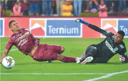  ?? / Óscar Pérez ?? Kevin Mier ataja el penalti cobrado por Daniel Cataño, jugada que cambió el rumbo de la final de la Liga BetPlay entre Nacional y Tolima.