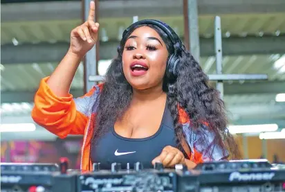  ?? /Eyadini Lounge ?? DJ Hlo was ecstatic when her song, ‘Isibani’, scooped the Song of the Year gong. She says those who voted are happy about their choice.