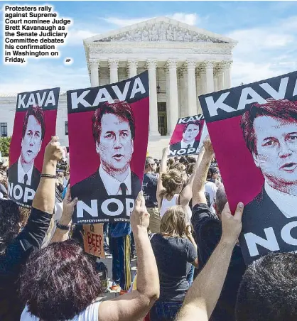  ?? AP ?? Protesters rally against Supreme Court nominee Judge Brett Kavanaugh as the Senate Judiciary Committee debates his confirmati­on in Washington on Friday.