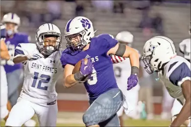  ?? Steven Eckhoff ?? Darlington’s Harrison Allen rushes past St. Francis defenders during the Tigers’ game against St. Francis at Chris Hunter Stadium last Friday.