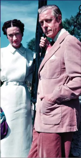  ?? ?? DOUBLE TAKE: In 2002 Charlie Watts, middle, wore the suit seen on the Queen’s uncle Edward, pictured above with his wife Wallis Simpson in 1951