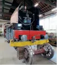  ?? GRAEME PICKERING ?? A still-boilerless No. 2007 Prince of Wales at Darlington Locomotive Works on February 25 with coupling rods in place, awaiting wheel testing on the rotator, seen to the left.