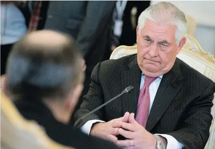  ?? — THE ASSOCIATED PRESS ?? Secretary of State Rex Tillerson listens to Russian Foreign Minister Sergey Lavrov in Moscow on Wednesday. Russia is accusing the U.S. of carrying out an unlawful attack in Syria.