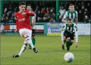  ??  ?? CITY SLICKER: Jack Redshaw fires in his penalty