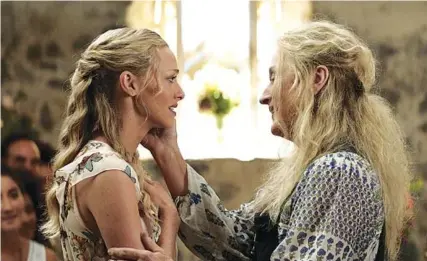  ?? UNIVERSAL PICTURES ?? Meryl Streep, right, and Amanda Seyfried in “Mamma Mia! Here We Go Again.”