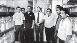  ??  ?? Mr. Nalin Delgoda, Chairman, Speed Water Systems (Pvt) Ltd., poses for a group photograph with invitees after ceremonial­ly opening the new Speed Water Distributi­on Centre at Armour Street, Colombo 12, recently.