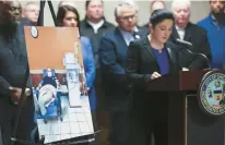  ?? SHANNA MADISON/CHICAGO TRIBUNE ?? Illinois Comptrolle­r Susana Mendoza speaks on behalf of her brother, Sgt. Joaquin Mendoza, in photo, during a news conference at Chicago City Hall on Tuesday.