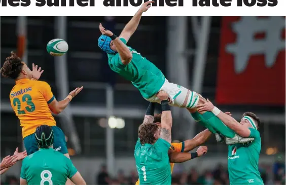  ?? Photo / AP ?? Australia’s Jordan Petaia and Ireland’s Tadhg Beirne vie for possession during yesterday’s test in Dublin.