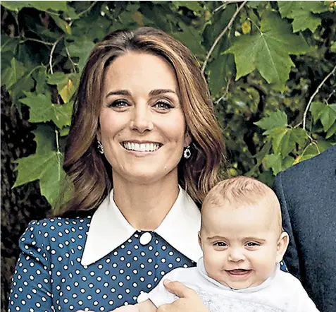  ??  ?? The Duchess of Cambridge poses with Prince Louis, her youngest child, in an official portrait to mark the 70th birthday of the Prince of Wales