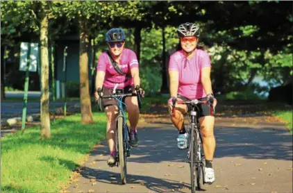  ?? PHOTOS BY MICHILEA PATTERSON — FOR DIGITAL FIRST MEDIA ?? Women leave from Riverfront Park in Pottstown during a weekly Monday evening group ride. The weekly ride started in July and is designed to get women on wheels.