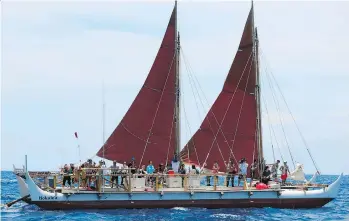  ?? SAM EIFLING/THE ASSOCIATED PRESS ?? The Hokulea sailing canoe set sail from Honolulu in 2014 to travel the world. It is set to make a triumphant return to Hawaii this month following a trip of 40,000 nautical miles (74,080 km).