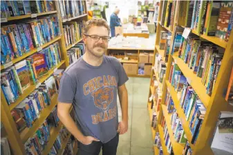  ?? Peter DaSilva / Special to The Chronicle 2016 ?? Brad Johnson has purchased the bookstore through an innovative community-lending program.