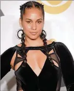  ?? TNS MICHAEL LOCCISANO/GETTY IMAGES FOR NARAS/ ?? Alicia Keys will host the Grammys tonight. Pictured: Keys poses in the press room during the 60th annual Grammy Awards at Madison Square Garden on Jan. 28, 2018, in New York City.