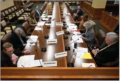  ?? (Arkansas Democrat-Gazette/Stephen Swofford) ?? Members of the Independen­t Citizens Commission meet at the state Capitol in Little Rock on Friday to discuss salary adjustment­s for elected officials. The committee decided not to approve any salary increases and to revisit the proposal in May.