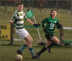  ??  ?? Darragh Farrell (Shamrock Rovers) and Josh Whyte (Gorey Celtic) follow the flight of the ball in their Under-14 Cup tie, won 4-2 by Rovers.