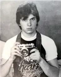  ?? Photo by Mark Lewis ©1980; used by permission ?? ■ John Moore, pictured here in 1980, began his journalism career as a photograph­er for his high school newspaper and annual.